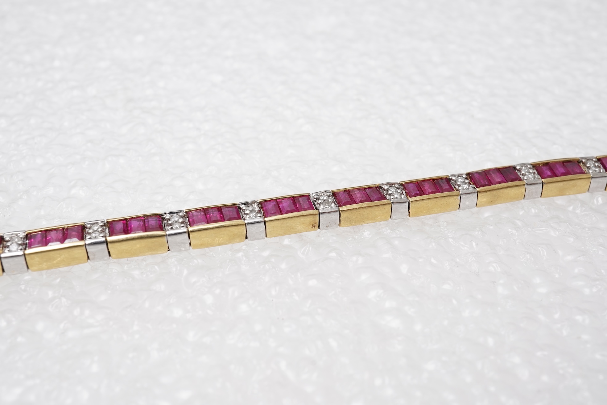 A ruby and diamond bracelet and pendant